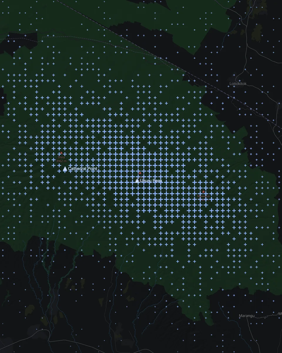 Kilimanjaro in blue crosses over a dark map, summit named